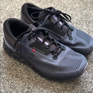 On Running Black Athletic Shoes with Textured Upper